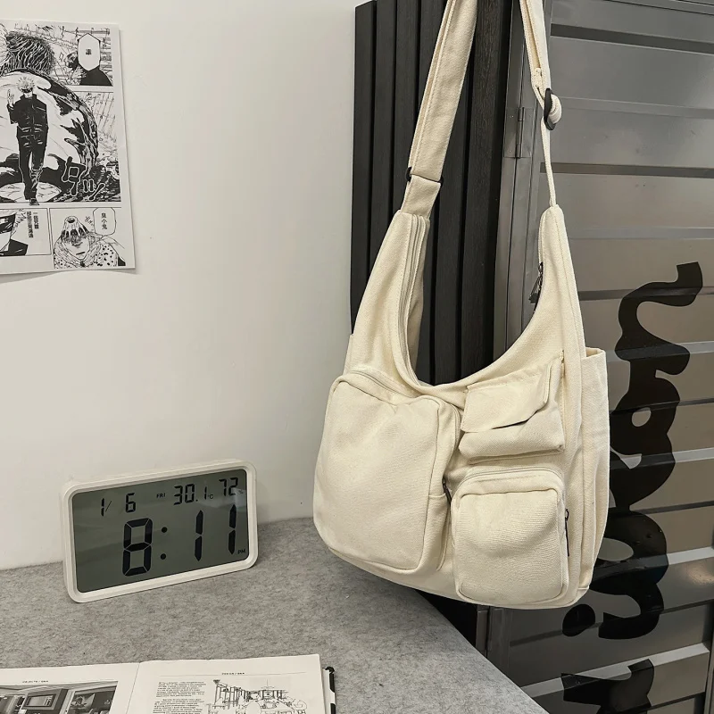 

2025New Large Capacity Dumpling Bag for Women, Casual Crossbody Bag for Men, College Students, Commuting Multi-Pocket Canvas Bag