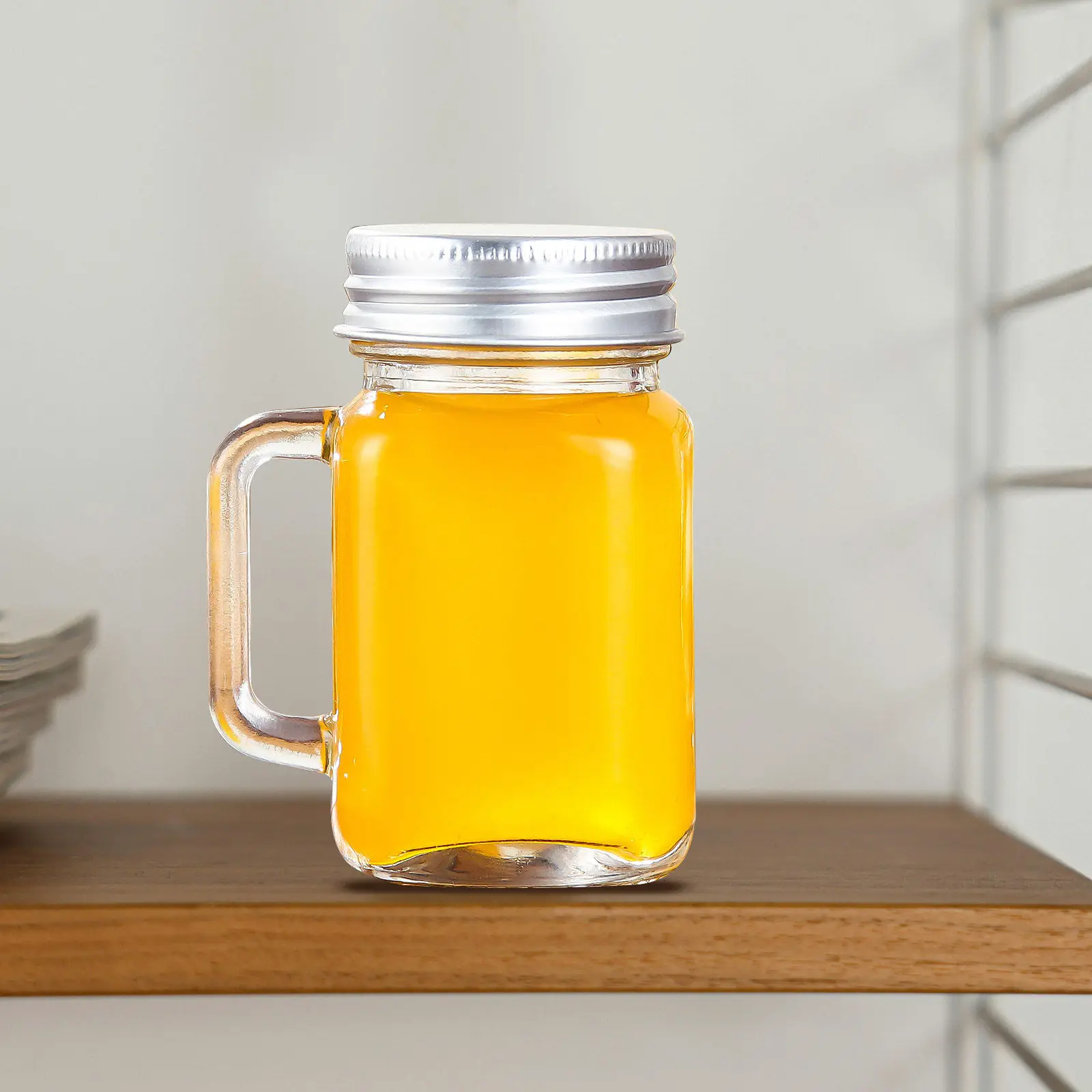 Juego de 4 Frascos Pequeños de Vidrio con Tapa Hermética y Asa, Frascos Transparentes para Miel, Frutas y Mermelada, Botellas de Almacenamiento, Recipientes para Mermelada del Hogar