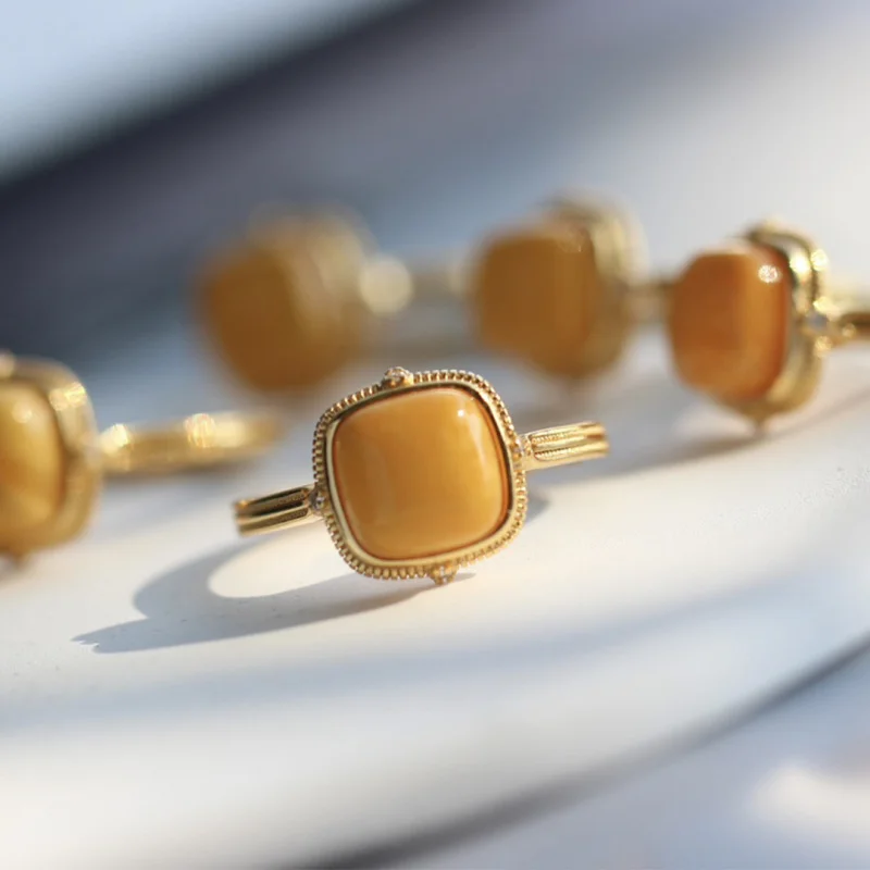 

Natural Amber Square S925 Silver Inlaid Chicken Fat Yellow Old Wax Open Ring Style