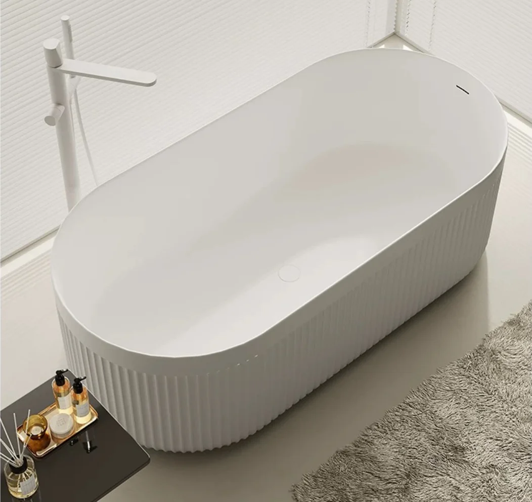 Meiyani White Fluted Groove  Free Standing Solid Surface Bath Tub Oval  Artificial Stone Bathtub With Drainer for Soaking