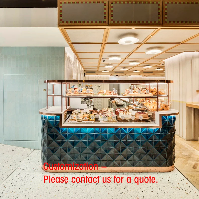 custom.Retro High-End Bakery with Gradient Blue Geometric Tile Cabinets, Brass Metal Trim & Glass Display Domes