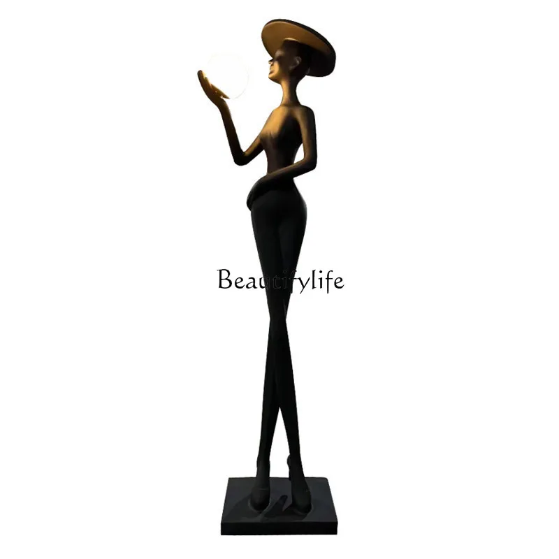 

Figure sculpture floor-to-ceiling large ornament Hotel restaurant corridor Welcome people Creative decoration Abstract artwork