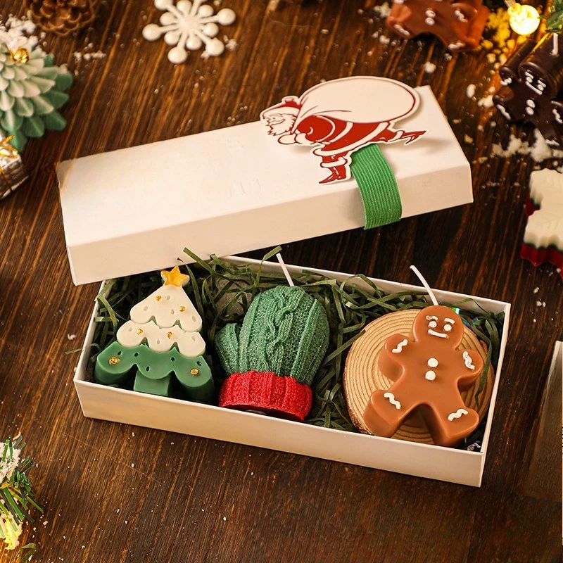 Handmade Christmas trees and deer-scented candles in a creative gift box
