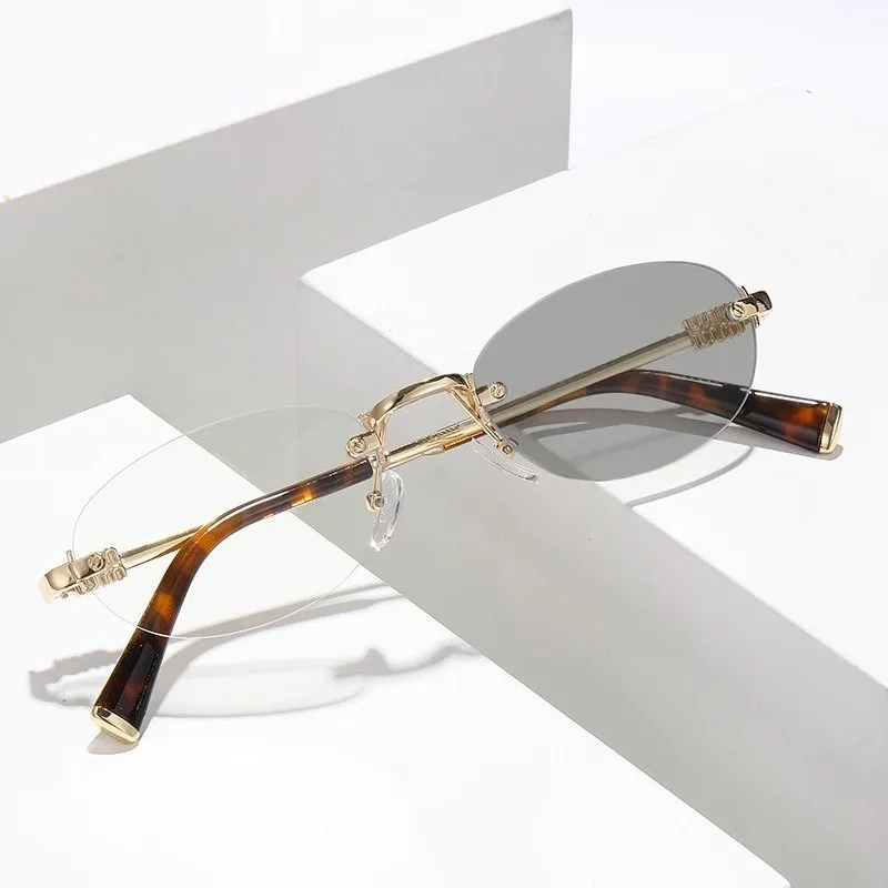 Randlose Ovale Photochrome Sonnenbrille für Männer und Frauen Leichter Metallrahmen Übergangslinse UV400-Schutz Sonnenbrillen