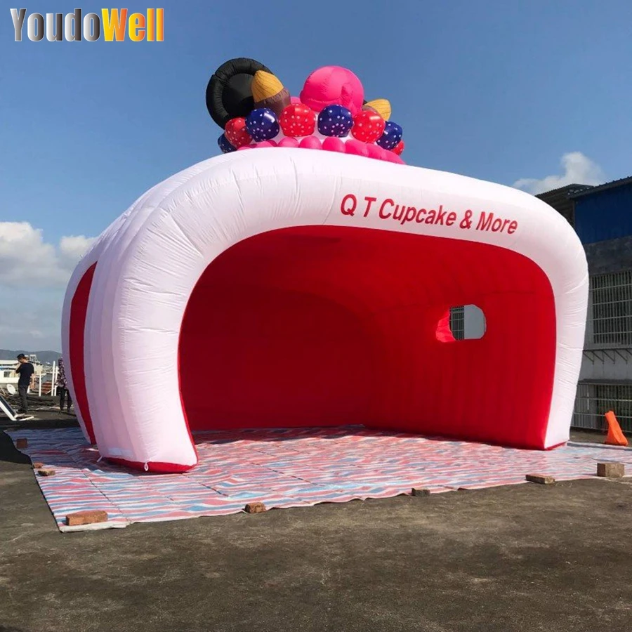 Customized Ribbon Finished Inflatable cake Booth Tent Red And White Curved Irregular Shape Opening With Top