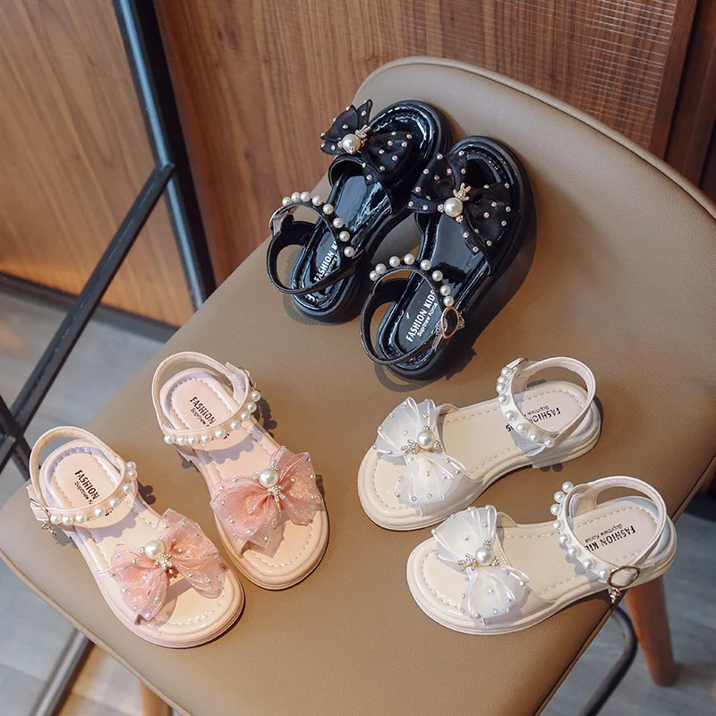 Children's Sandals Summer Girl for 2024 Fashion Pearl Bow Tie Girls Shoes Pink White Black Flat Heel Beach Sandals black pink