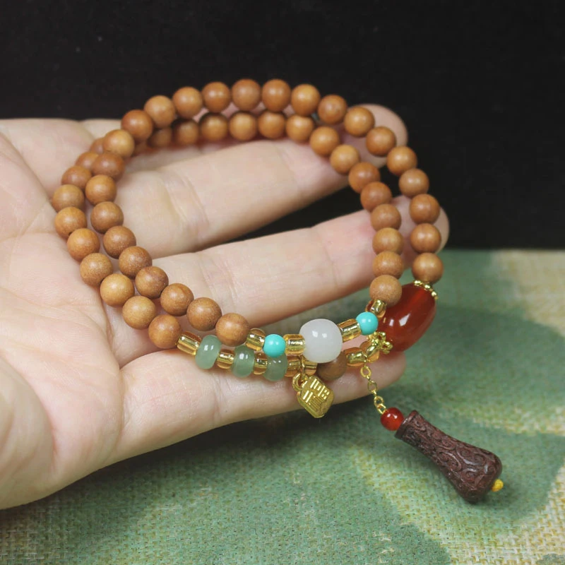 

Babu Sandalwood DIY Fortune Tag Vase Buddha Bead Bracelet 6mm Men's and Women's Prayer Bead Bracelet Cultural Ornament