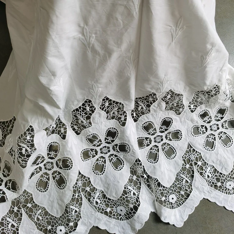 

Laser water-soluble milk silk white embroidered hollow floral cotton fabric hem embroidered lace fabric for DIY clothing sewing