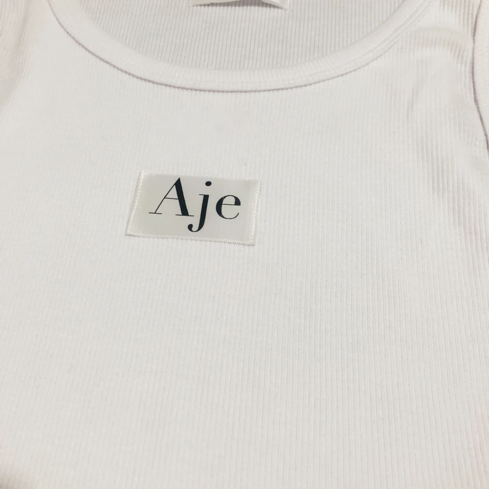 AJE Bodycon فستان أنيق صغير فاخر قابل للتمدد للحفلات والنوادي مثير موضة المرأة الصيف ملابس غير رسمية أنيقة سليم صالح فستان