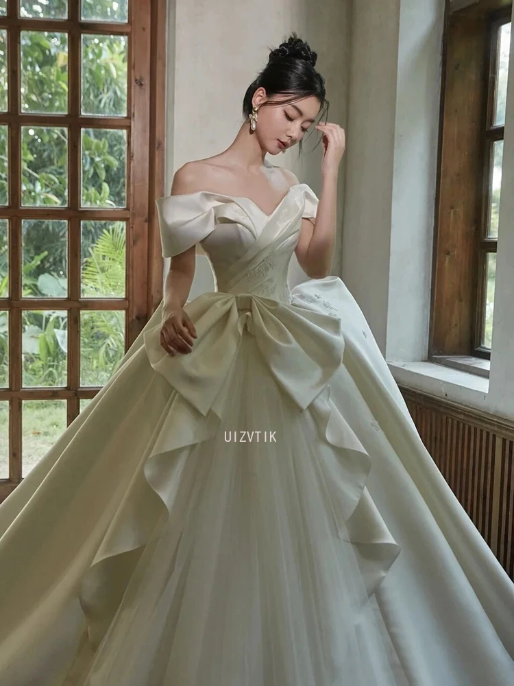 فساتين زفاف بيضاء فاخرة من الساتان للنساء 2026 فستاين سهرة/فساتين الحفلات بدون أكتاف وأربطة طول الأرض Vestidos De Novia مصنوعة حسب الطلب