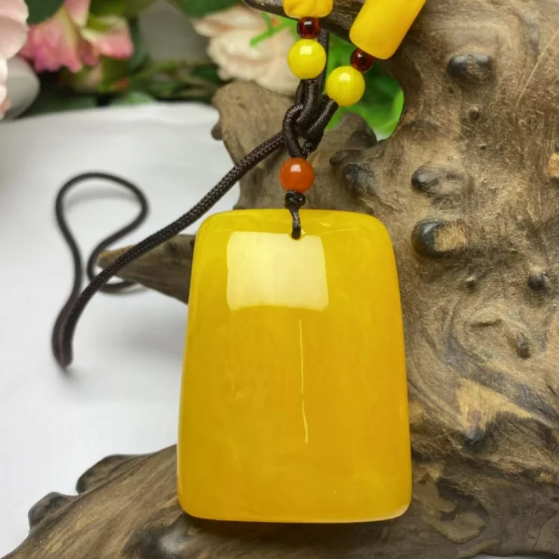 

Live Supply Chicken Oil Yellow Amber Peace Pendant Sweater Chain Long Necklace for Men and Women Amber Pendant