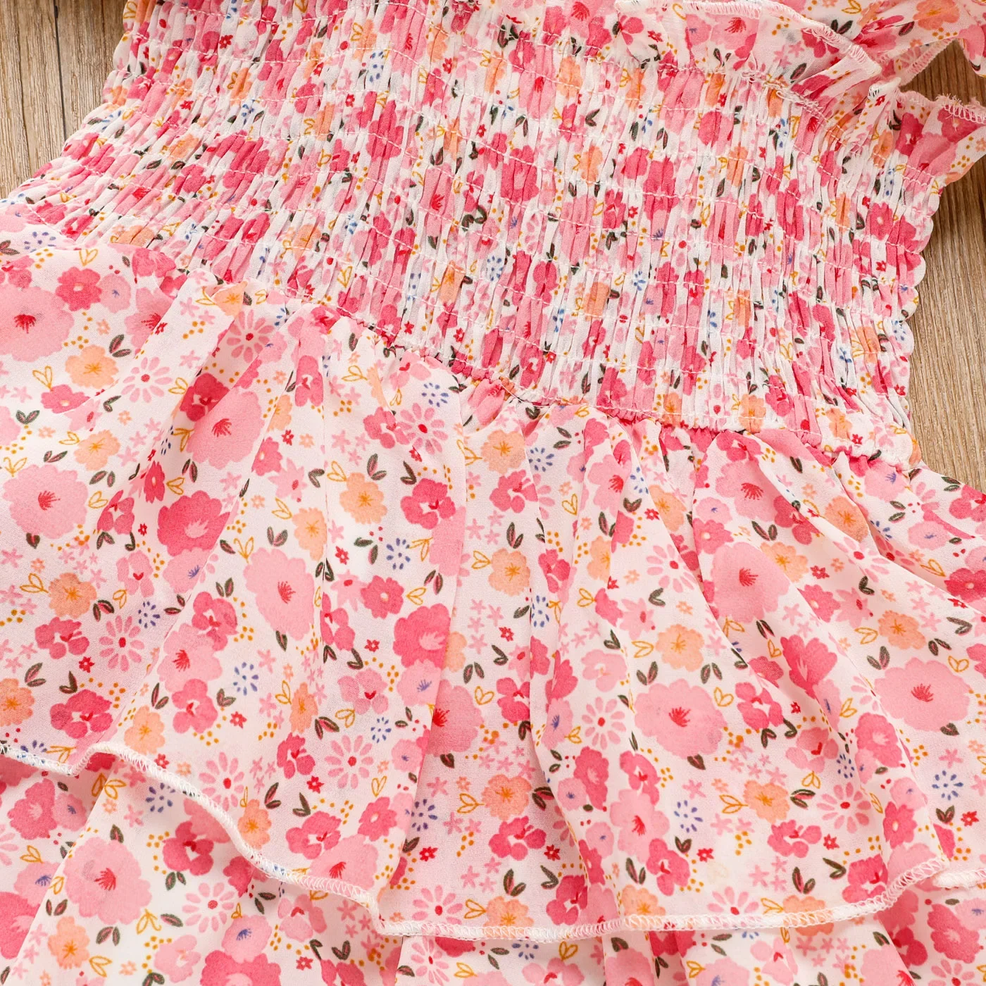 PatPat Toddler Girl Sweet Floral Print Smocked Ruffled Sleeveless Dress Suitable for Summer Season Perfect for Outings