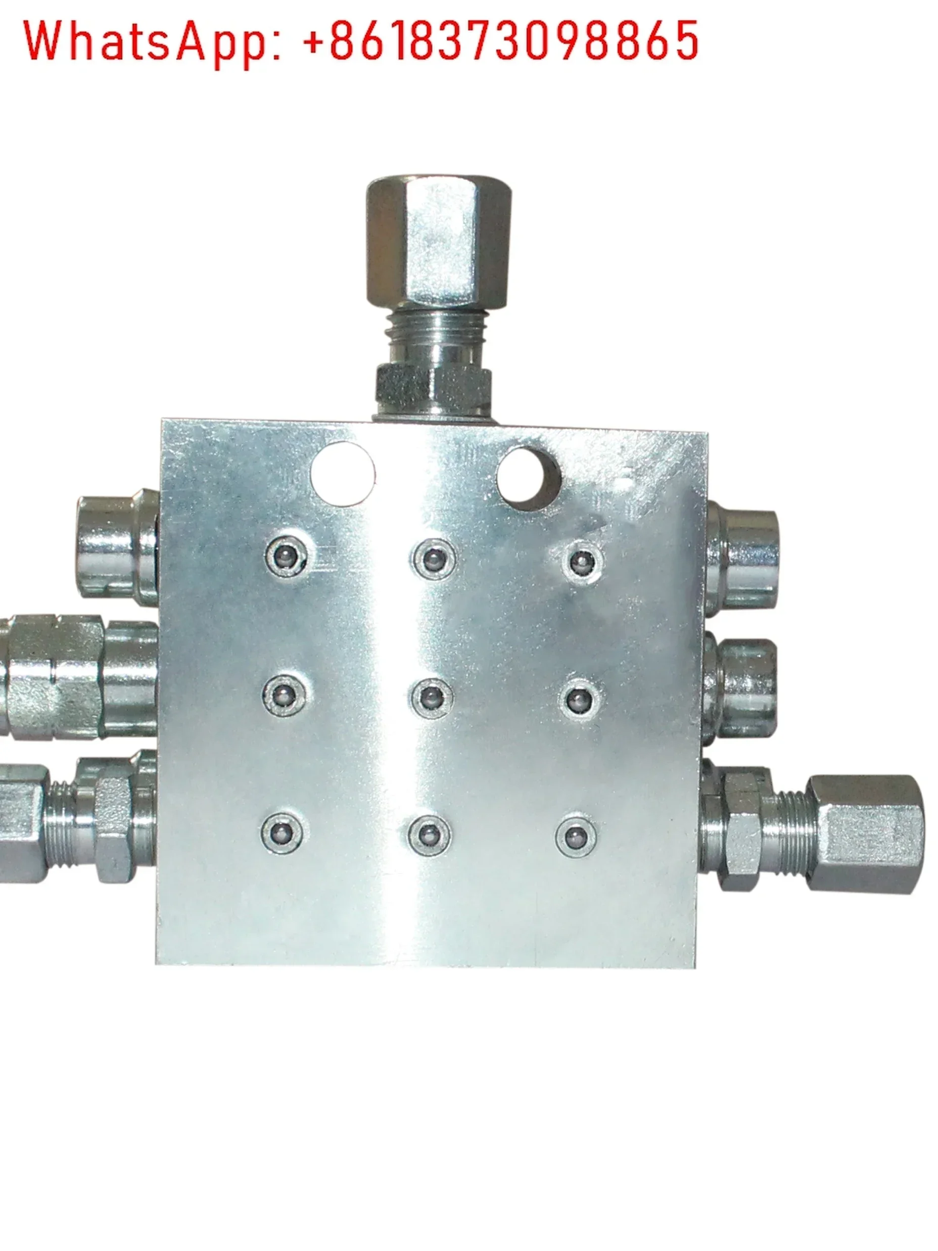 Progressive distributor JPQ-M. Oil distributor block. Distribution valve.