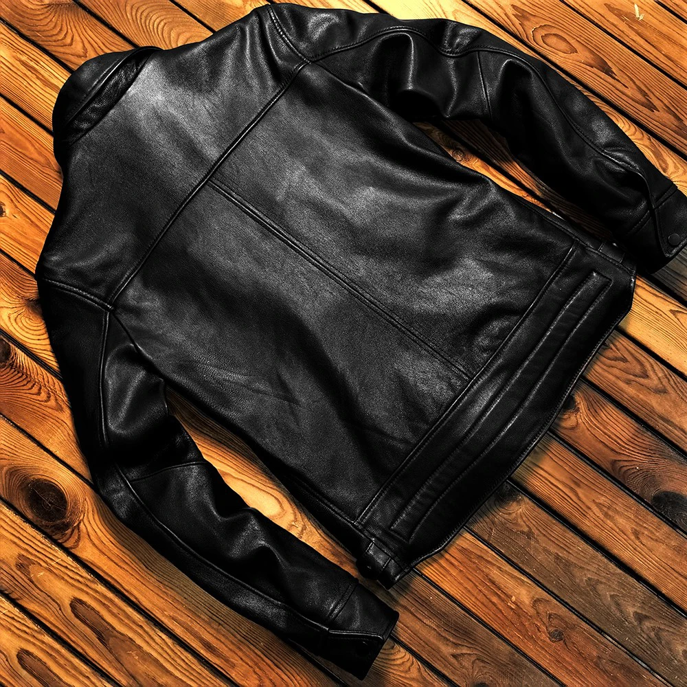 سترة رجالية فاخرة من الجلد الطبيعي موديل 2025 بياقة مدببة بقصة ضيقة ومتعددة الجيوب من جلد الماعز السائق سترة جلدية للرجال