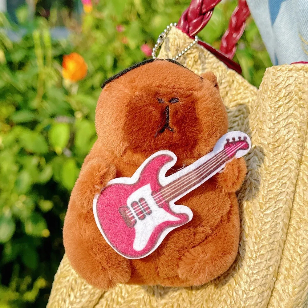 Peluche bambola chitarra capibara ciondolo peluche portachiavi creativo peluche capibara portachiavi carino divertente rock capibara bambola di peluche