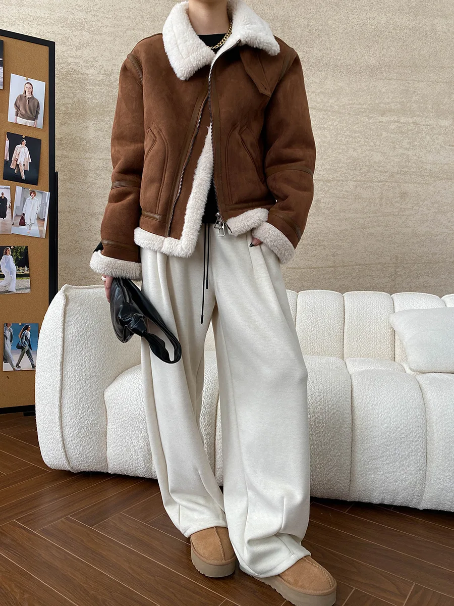 Winter women\'s casual solid color lapel long sleeved loose fur one-piece jacket