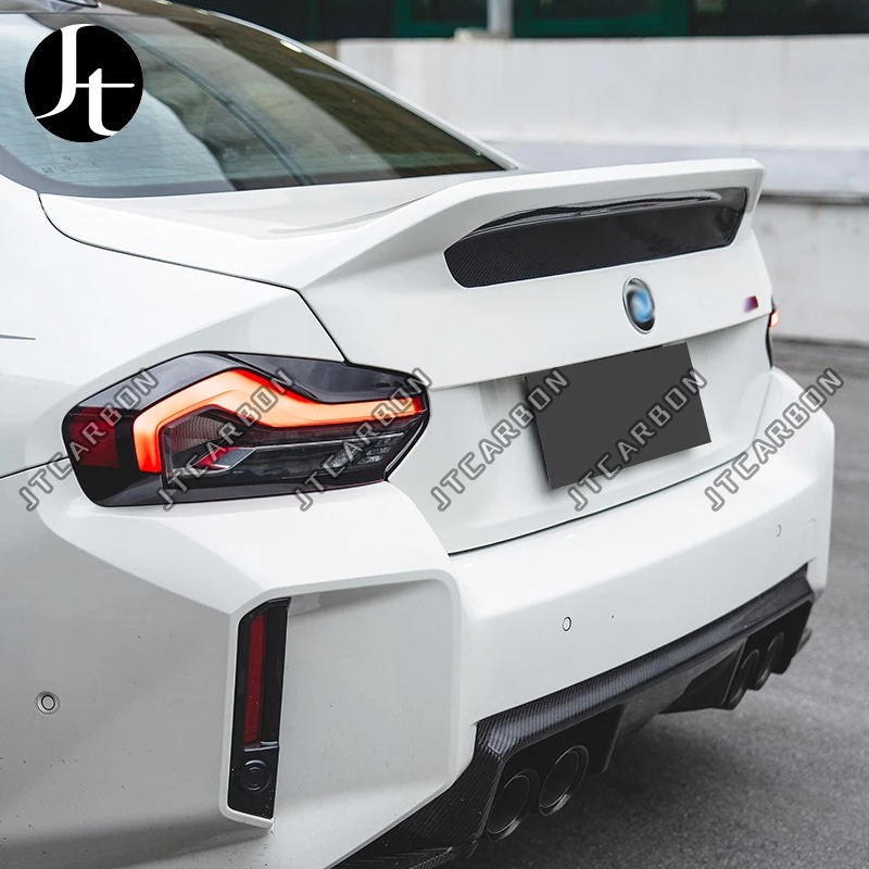 

Задняя крышка из сухого углеродного волокна V-стиля G87 для BMW M2 2023+ Prepreg Задняя крышка багажника из углеродного волокна для BMW M2 G87 G42 Капот Ducktail