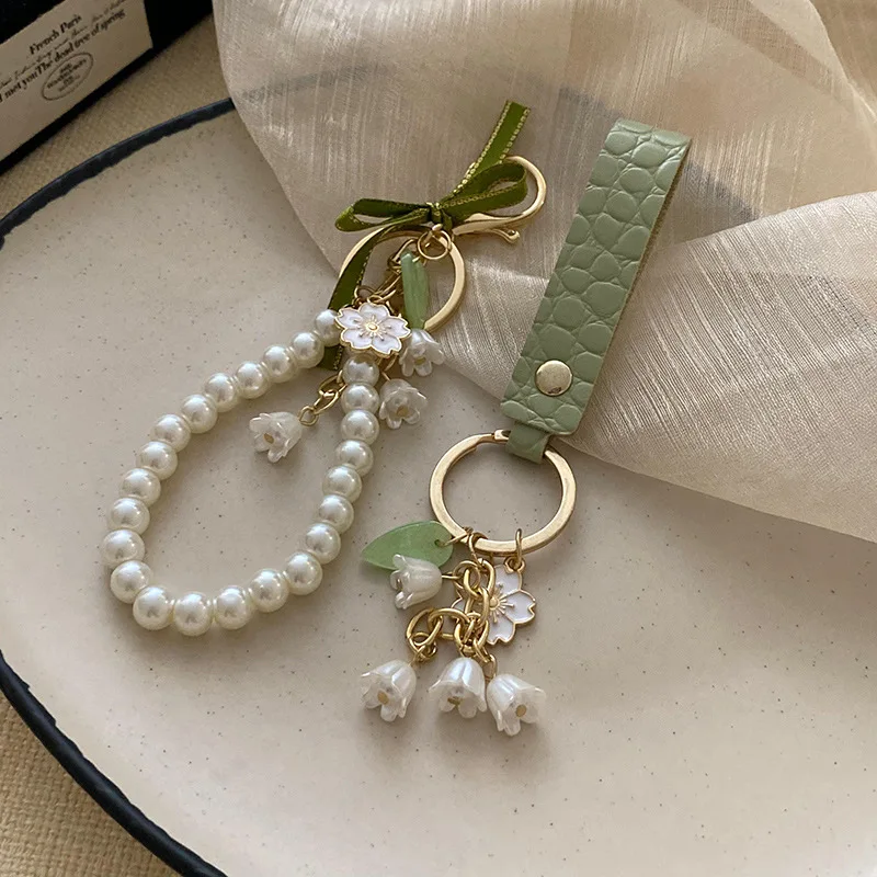 1/2 قطعة Ins الشريط الأخضر الغابات تحت عنوان فستان عيد ميلاد قلادة ، ملحق محرك فلاش USB ، مكافحة فقدان زنبق الوادي قلادة