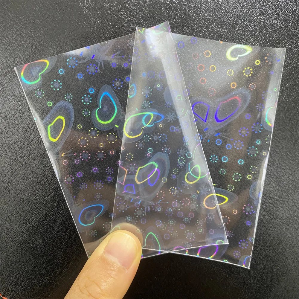 50pcs/Lot 65*90MM Little Stars Laser Flashing Card Sleeves Protector For Magic PKM FAB Cards Holder Holographic Foil Film