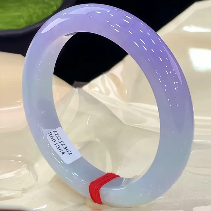 , a single jade , a violet bracelet
