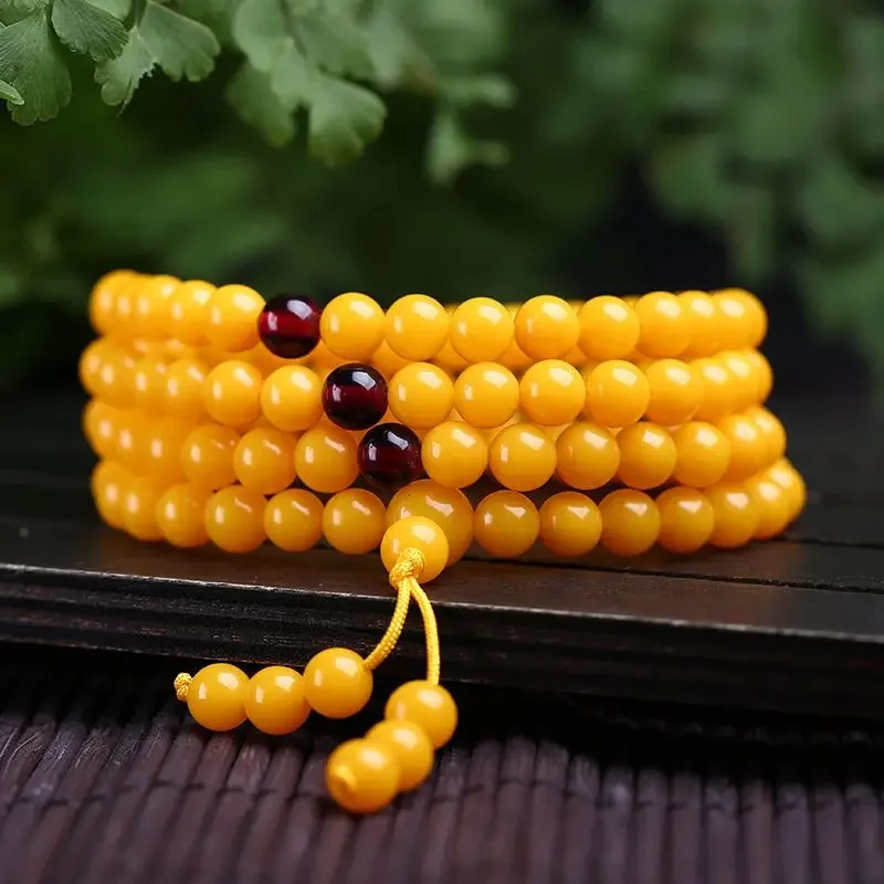 

Natural old material beeswax bracelet chanterelle yellow multi-circle yellow amber bracelet men's and women's Buddha bead