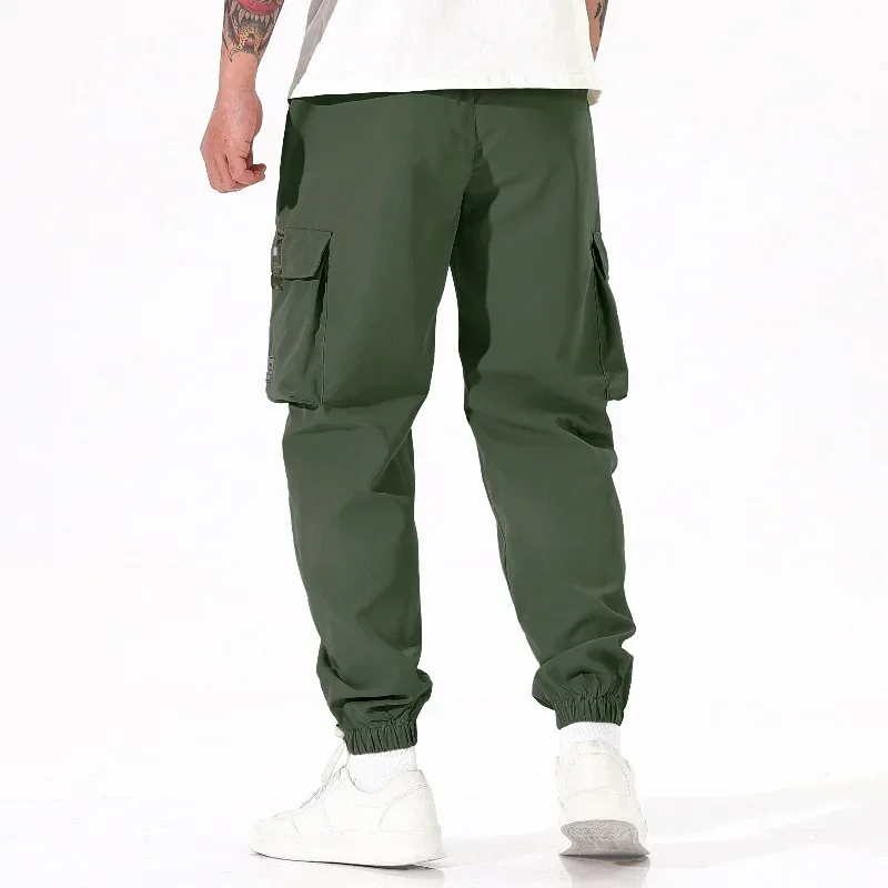 Calças cargo masculinas versáteis, confortáveis, casuais, de secagem rápida, tecido legal, cor sólida, primavera verão, calças esportivas