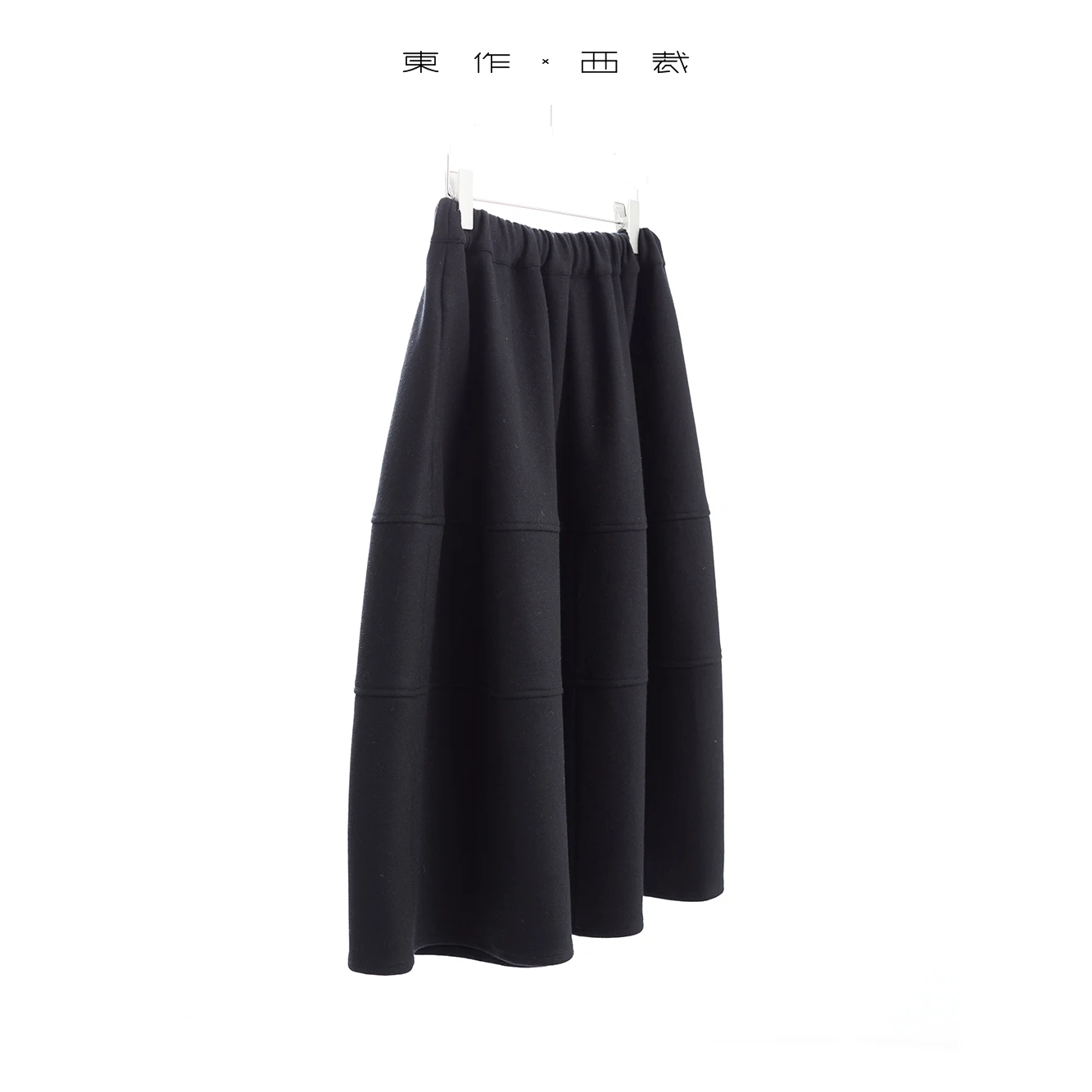 Lussuosa e squisita in stile coreano nuova gonna ombrello di fascia alta in lana nera autunno e inverno 2025 per donna