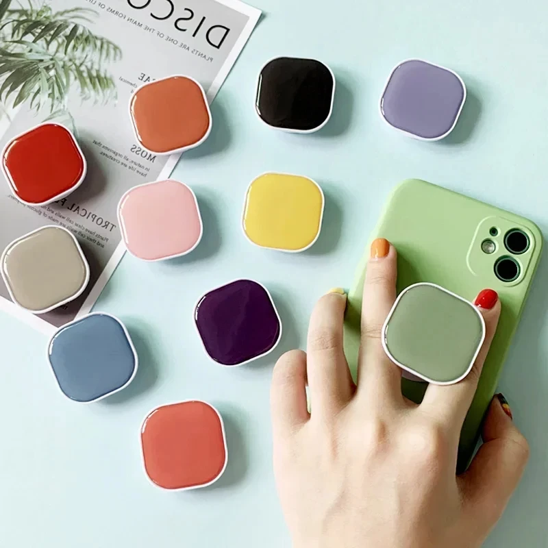 

Trending! Air Bag Phone Stand Creative Drop Glue | Square Solid Color, Lazy Desktop/Car Holder for iPhone 11/13/14/15/16 Samsung