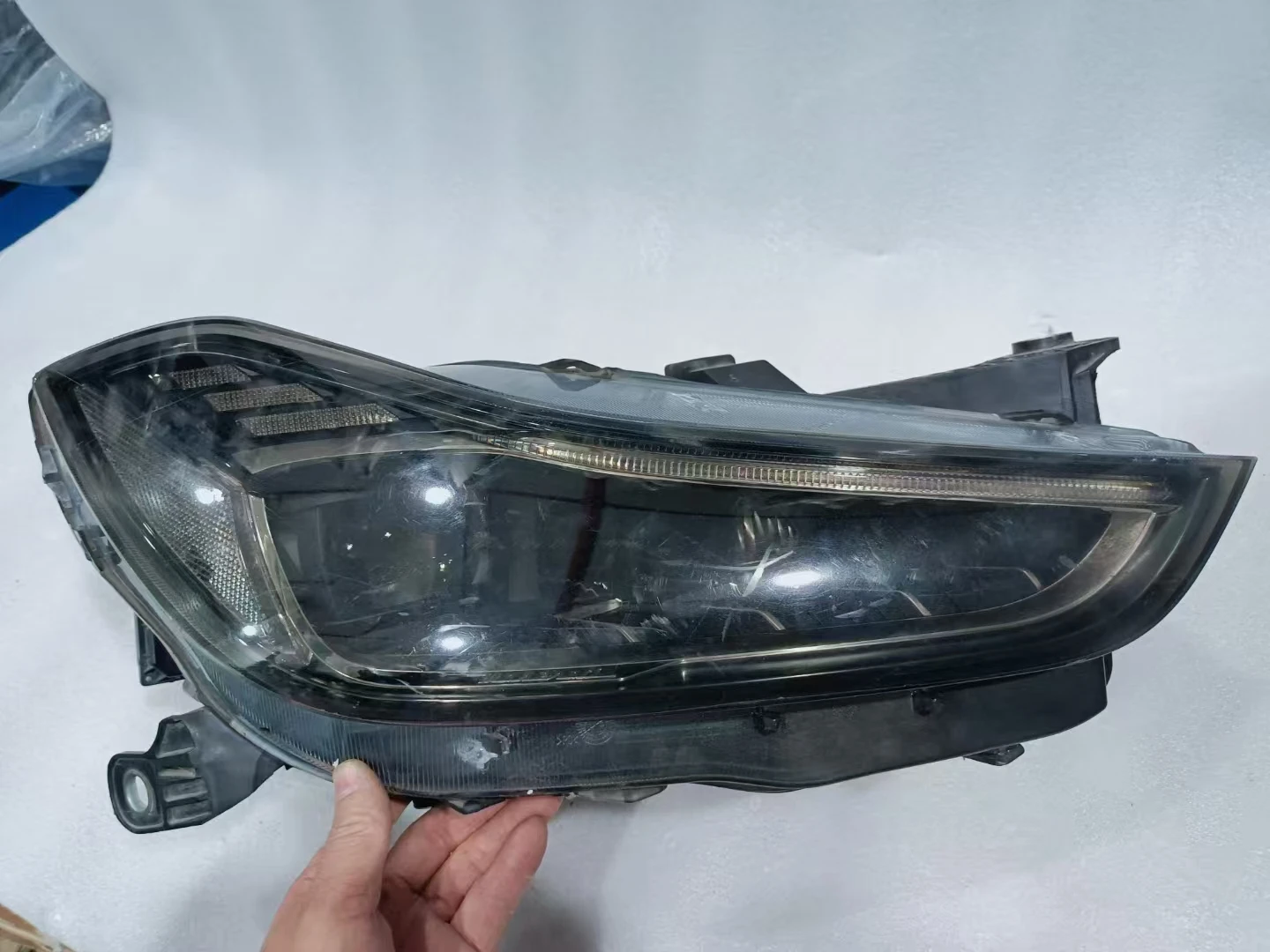 23 سنة للمصابيح الأمامية مصفوفة Geberit الأصلية المفككة مصد السيارة الأمامي مصبغة المصباح باب السيارة طقم هيكل المحرك #2