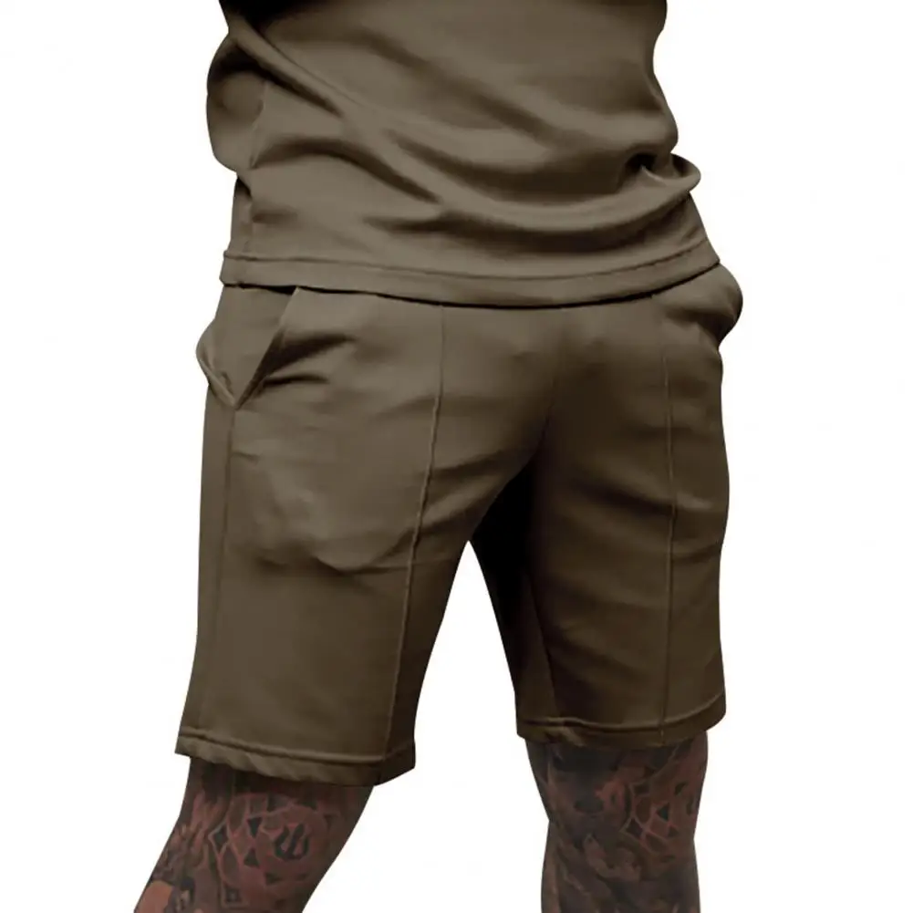 Celana Pendek Pria Regular Fit Celana Pendek Kaki Lebar Pinggang Elastis Menengah Pria dengan Saku Celana Panjang Kasual Warna Solid untuk Pakaian Sehari-hari