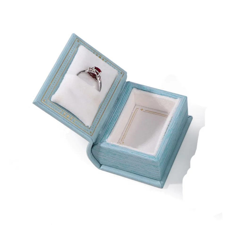 

Refined Creative Book Shape Ring Box Flip Lid Magnetic Engagement Ring Case Velvet Storage Box Jewelry Packaging Gift Box