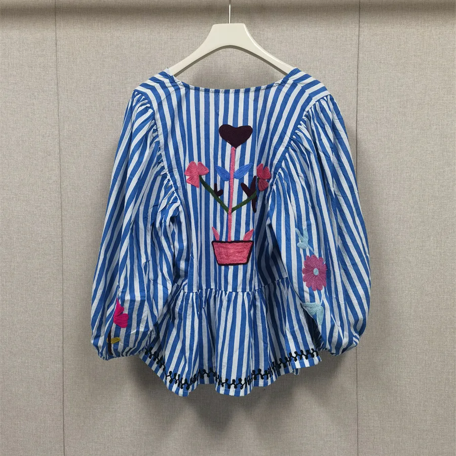 เสื้อเชิ้ตหลวมลายทางสีฟ้าของผู้หญิงแขนยาวผูกแฟชั่นเสื้อลําลอง