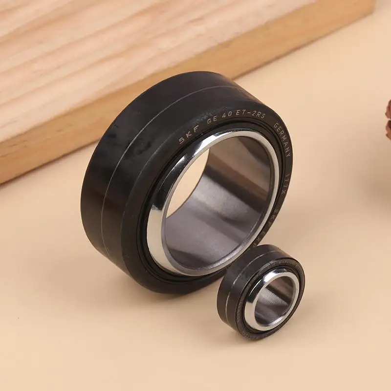 ตลับลูกปืนแบบข้อต่อเรเดียล SKF รุ่น GE15 17 20 25 30 35 40 2RS เพื่อการเคลื่อนที่เชิงเส้นที่มั่นคง