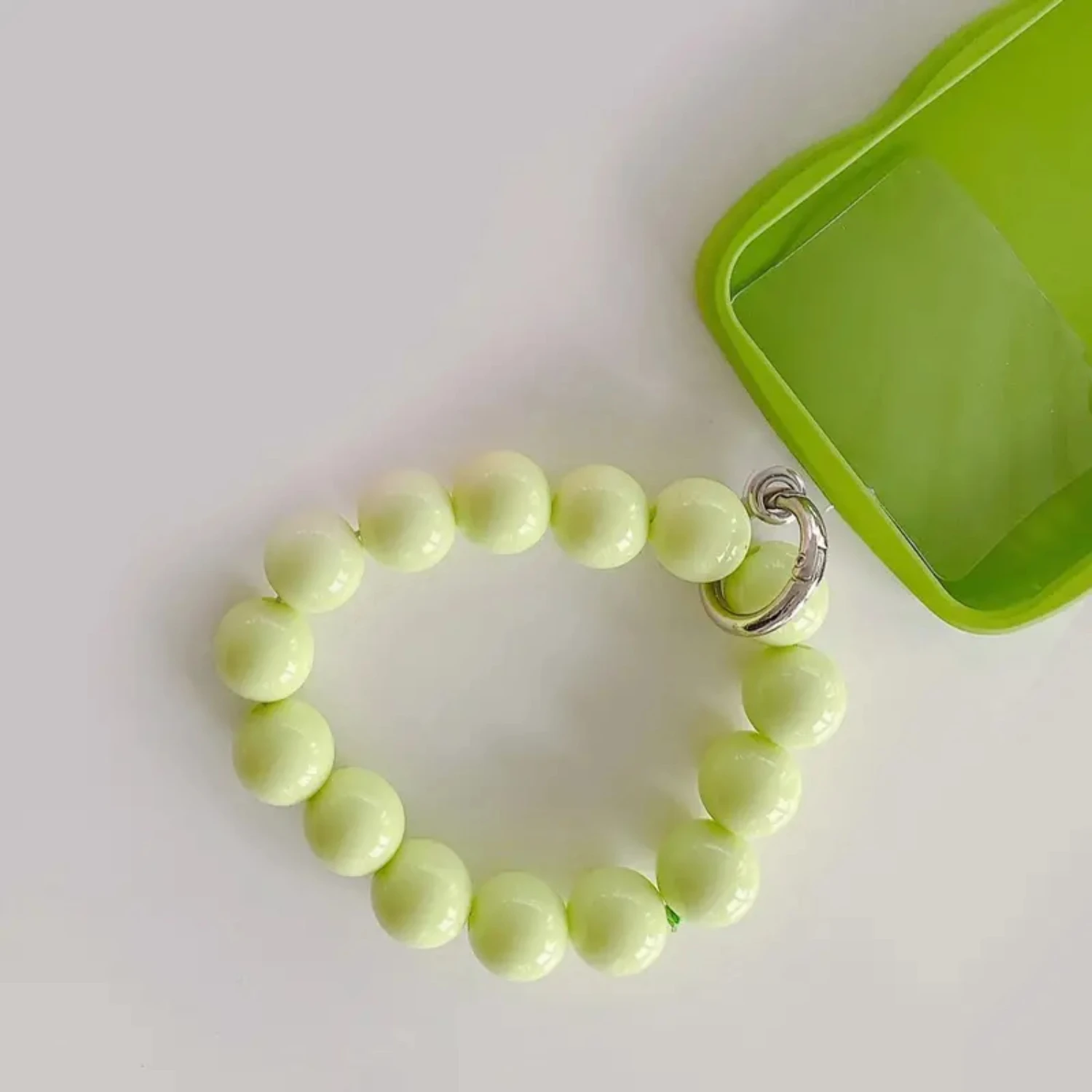 

A Green String Of Beads Phone Lanyard