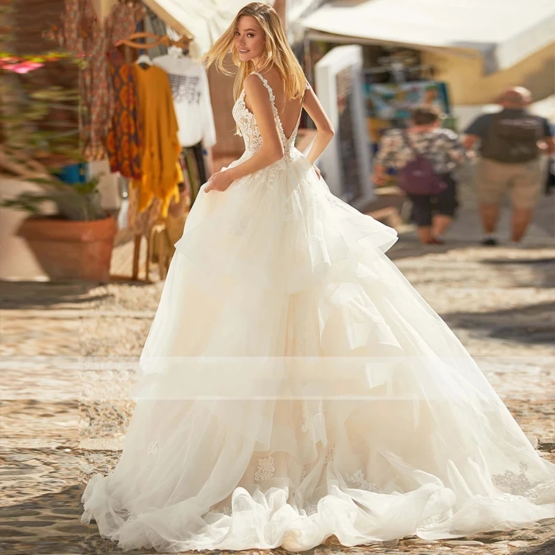 Vestidos De Novia modernos con cuello en V, sin mangas, Espalda descubierta, Sexy, tul escalonado, línea A, largo hasta el suelo