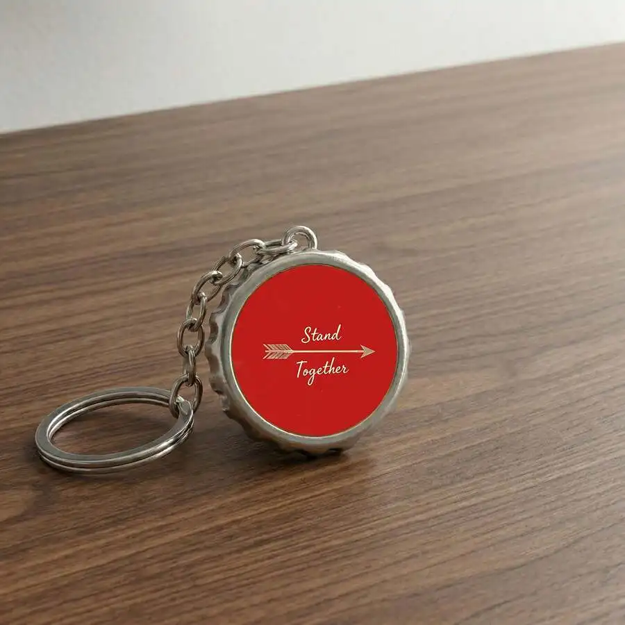 

Stand Together Motivational Red Button Keychain With Arrow Design