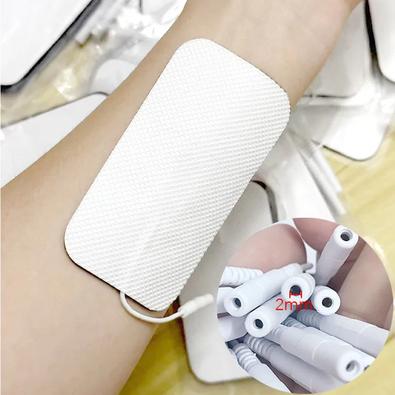 استبدال الوسادة لعشرات وحدة آلة تدليك العضلات محفز 2 مللي متر التوصيل أقطاب الوسادة قابلة لإعادة الاستخدام لصقة هلامية لأداة تدليك Ems