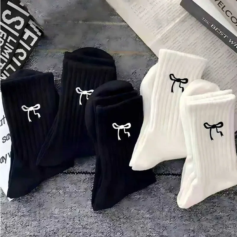 3 pairs of black and white women's breathable bow round neck mid tube socks in spring and summer, elegant bow pattern design