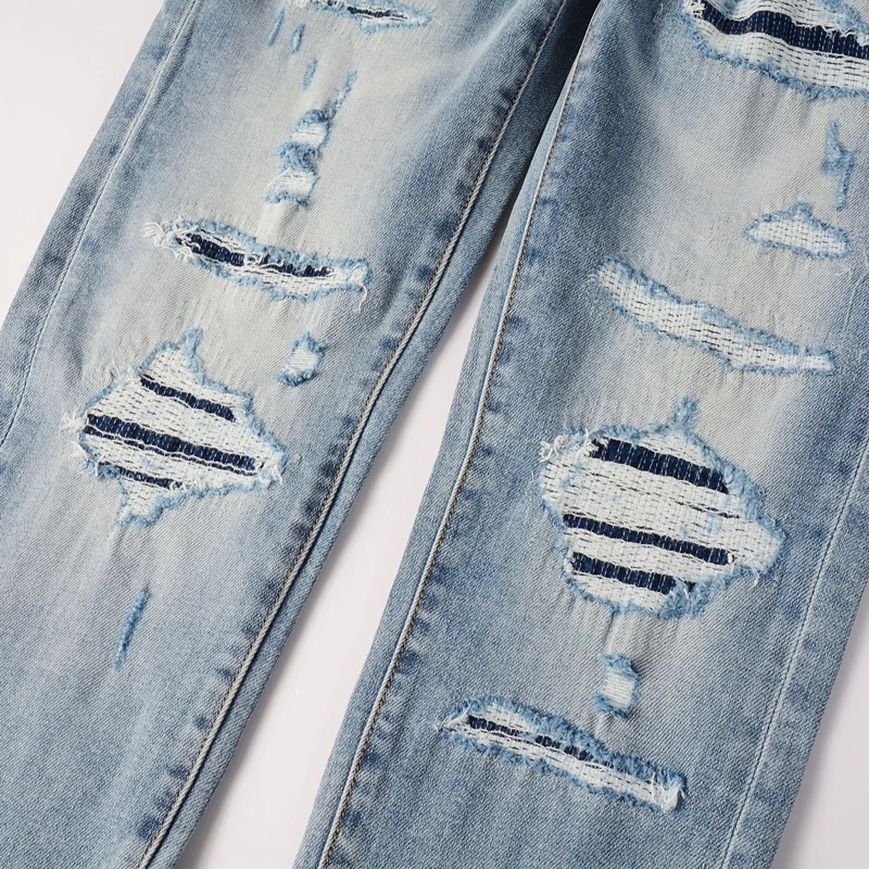 

Y2K street designer fashionable new style washed water nostalgic elastic slim fit perforated black leather patch jeans hip-hop