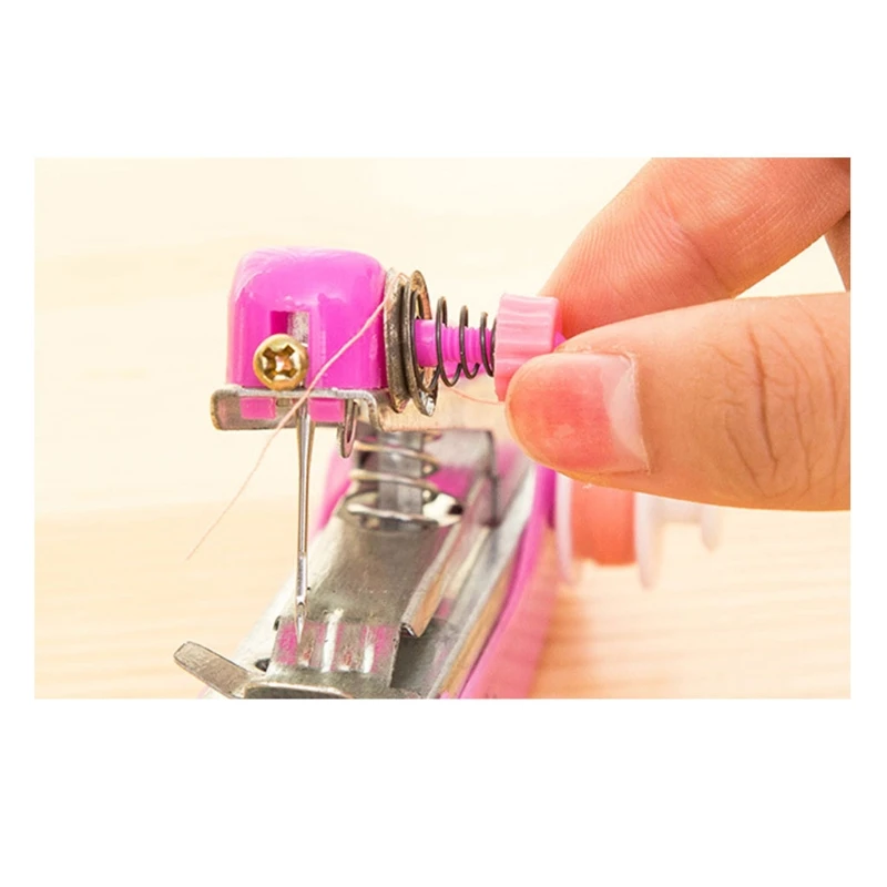 1pc Portable Mini Manual Sewing Machine Simple Operation Sewing Tools Sewing Cloth Fabric Handy Needlework Tool