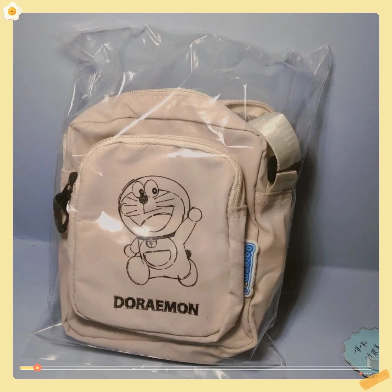 Anime Doraemon merchandise borsa di tela da donna di marca co, tracolla per studenti, borsa a tracolla di nicchia, borsa casual per cellulare, regalo