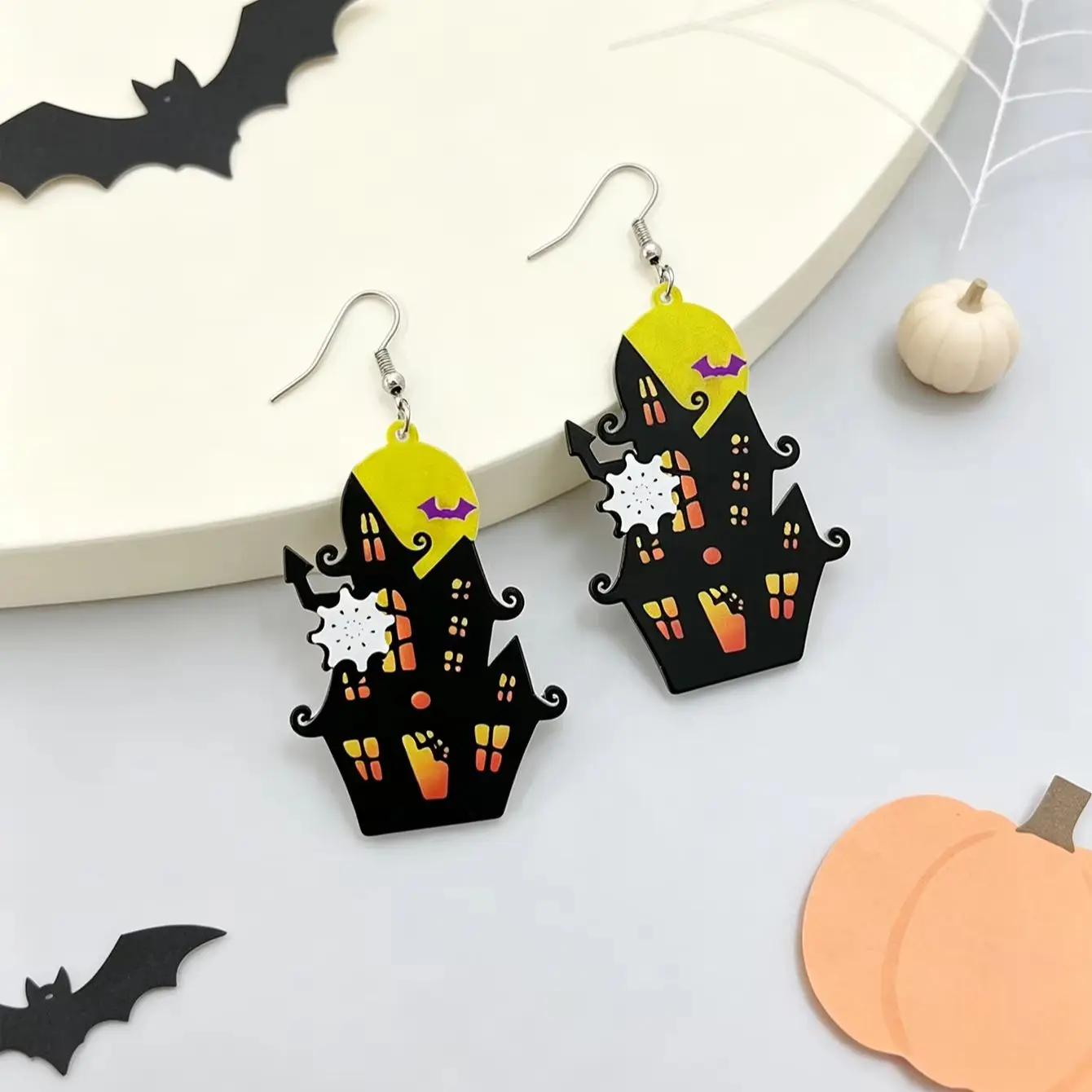 1 pair of Halloween haunted house style dangling earrings, acrylic creepy castle pendant earrings with moon, bat, and ghost prints, suitable for cosplay themed parties, autumn and winter holiday earrings