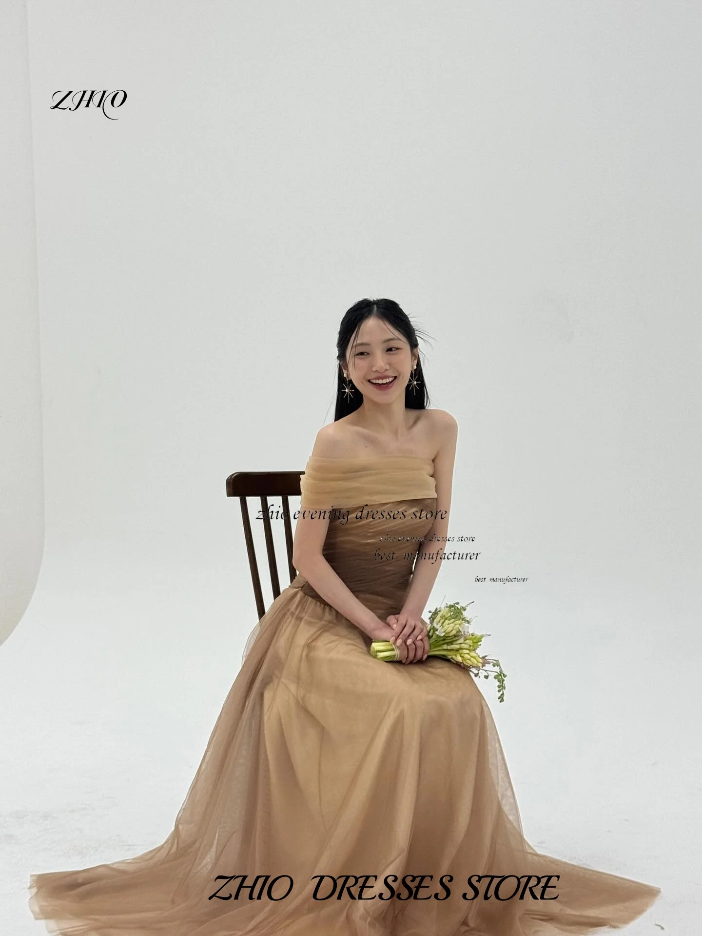 فستان ZHIO مزرف باللون الشامبانيا من التول فساتين كورية بدون حمالات بدون أكمام فساتين مخصصة بطول الأرض فساتين رسمية ستناء