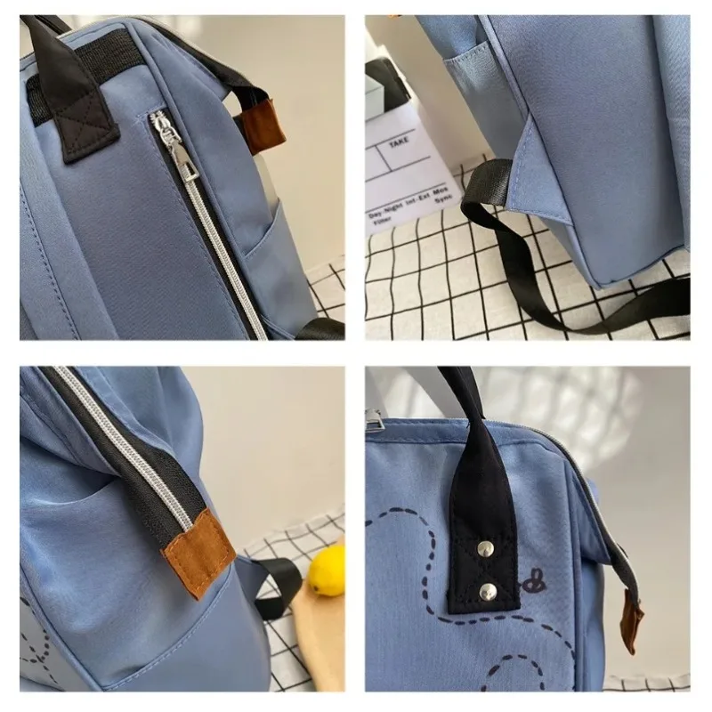 ديزني حقيبة الأم الجديدة أزياء الكرتون طباعة سعة كبيرة حقيبة الأم والطفل حقيبة ظهر للحفاضات زجاجة مقاومة للماء