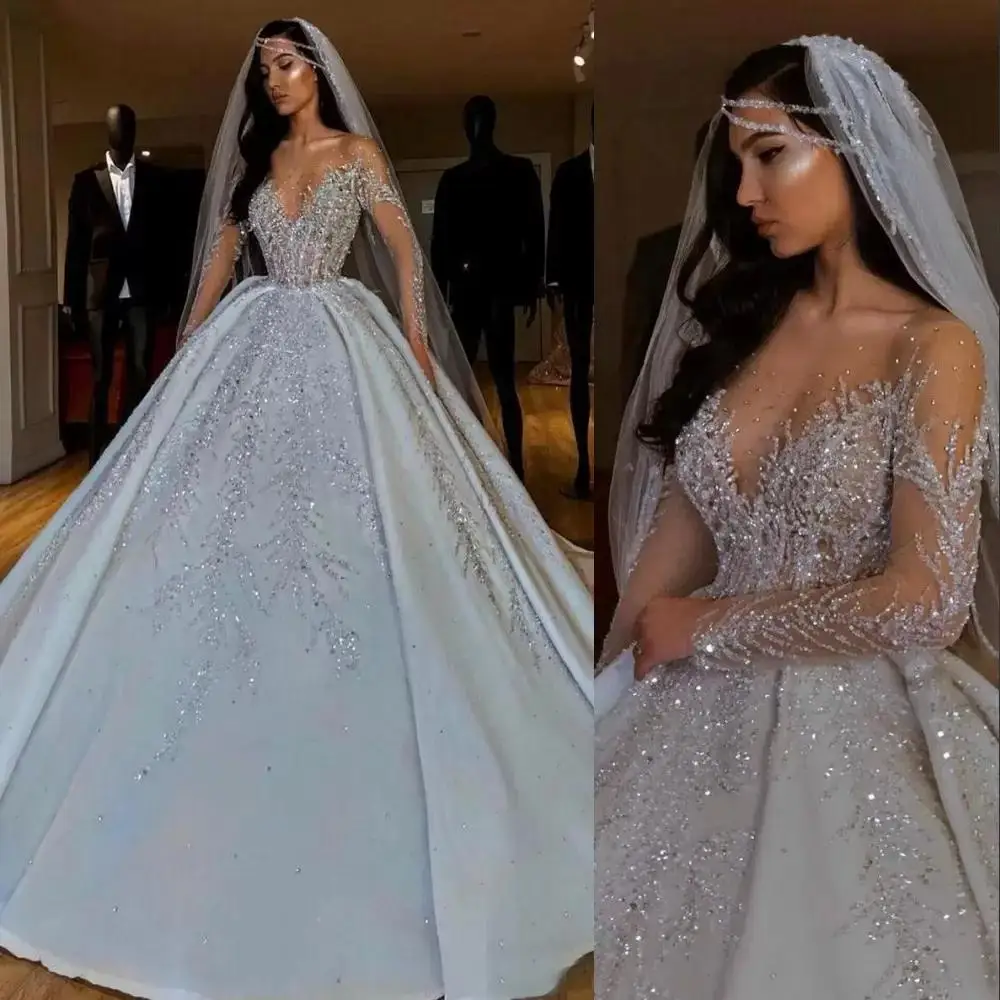 

Dubai Arabic Luxury A Line Wedding Formal Bride Dress JeweL Neck Illusion Sheer Crystal Beading Long Sleeves Satin Backl