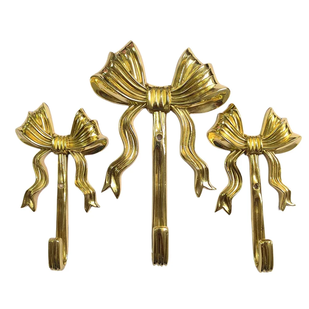 

Stylish Gold Bow Hooks Designed to Enhance Your Home Decor While Providing Practical Hanging Solutions for Various Items