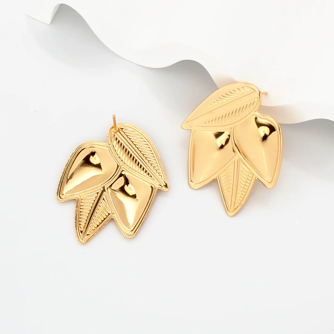 DIY accessories Retro alloy leaf earrings women's light luxury niche asymmetric stud earrings F24290