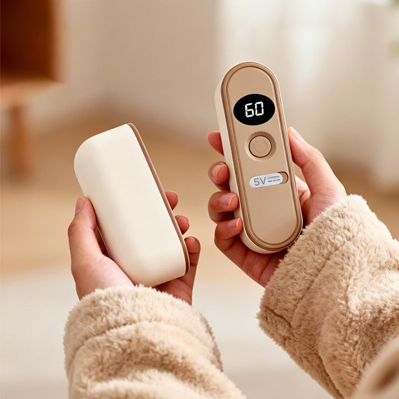 Split style hand warmer with magnetic suction and LCD display for temperature independent heating, changing from one to two view 5