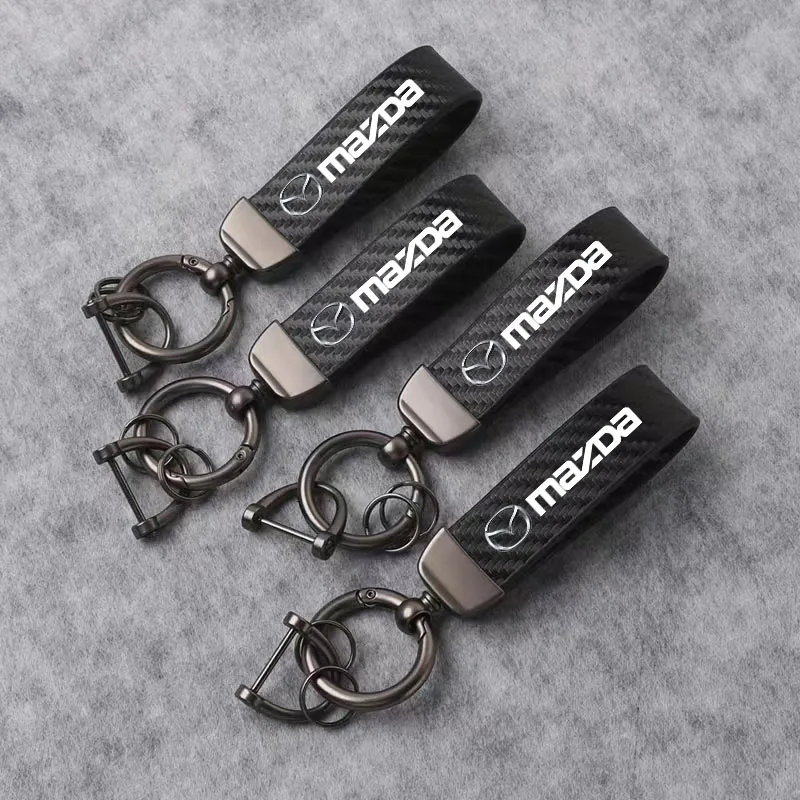 

Carbon Fiber Car Keycase Ring High Quality Leather Key Chain For Mazda 2 3 6 5 Atenza CX3 CX5 MX5 CX7 Axela CX30 CX90 CX60 CX50