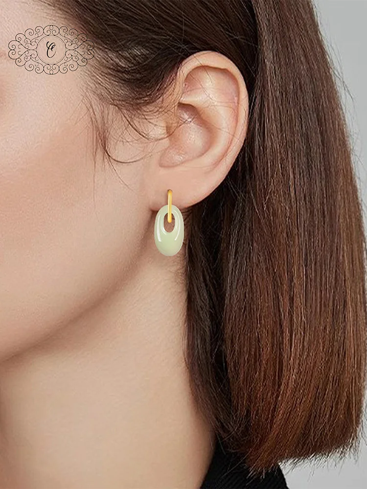 

Elegant Hetian Jade Princess Drop Earrings, Graceful Hollow Oval Design with Gold-Tone Hoop, Classic & Modern Jewelry